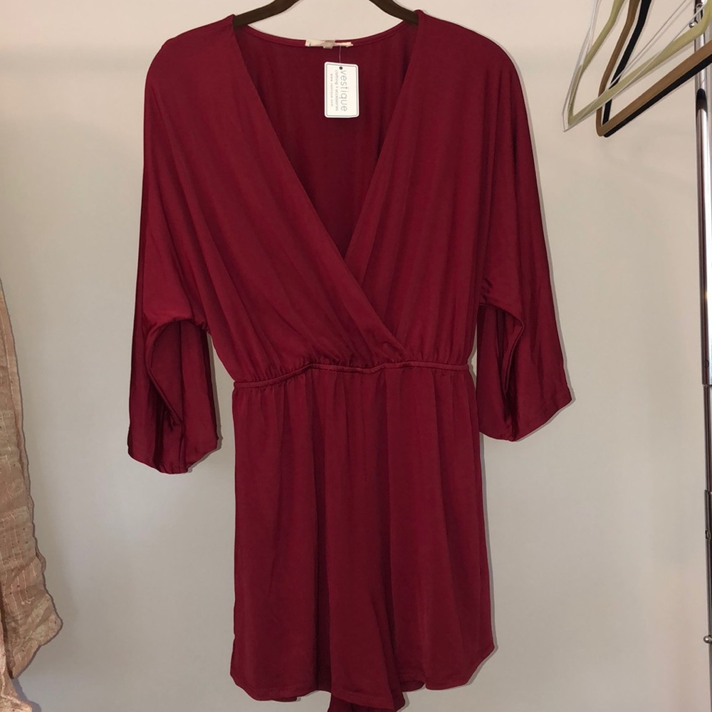 Vestique maroon long sleeved romper!
